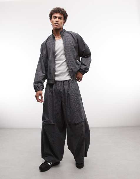 COLLUSION XL baggy track pants in black check - view 1