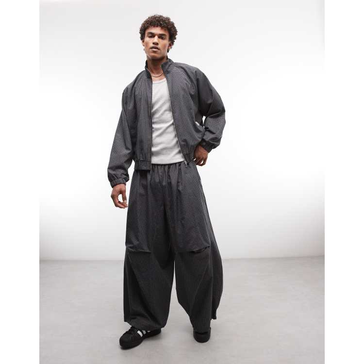 COLLUSION XL baggy track pants in black plaid | ASOS