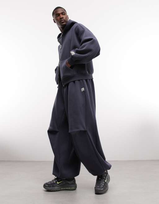 COLLUSION XL baggy trackies in navy, 3 of 5