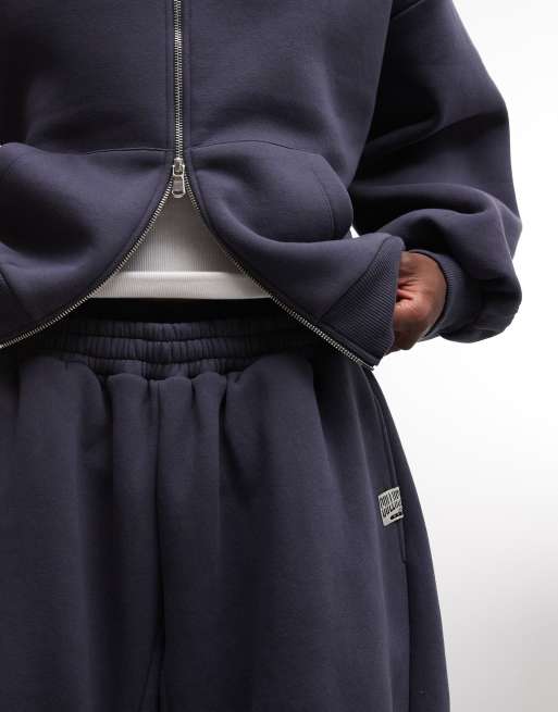 COLLUSION XL baggy trackies in navy, 4 of 5