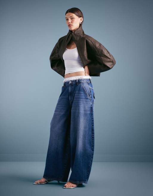 COLLUSION XL balloon low rise jeans in mid blue