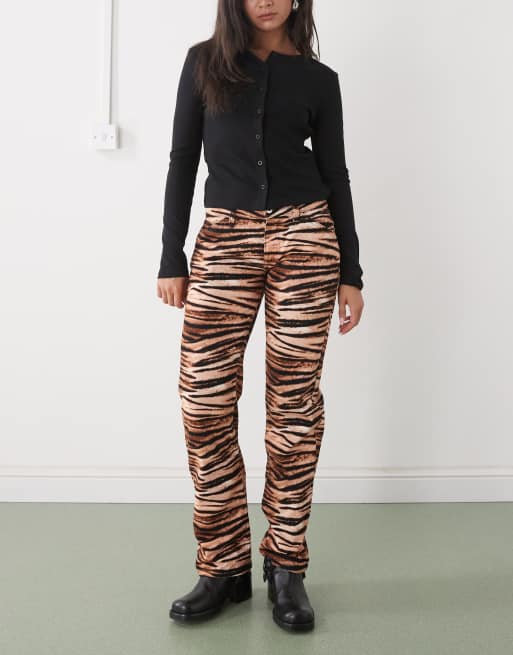 COLLUSION Y2K low rise slim jeans in tiger print