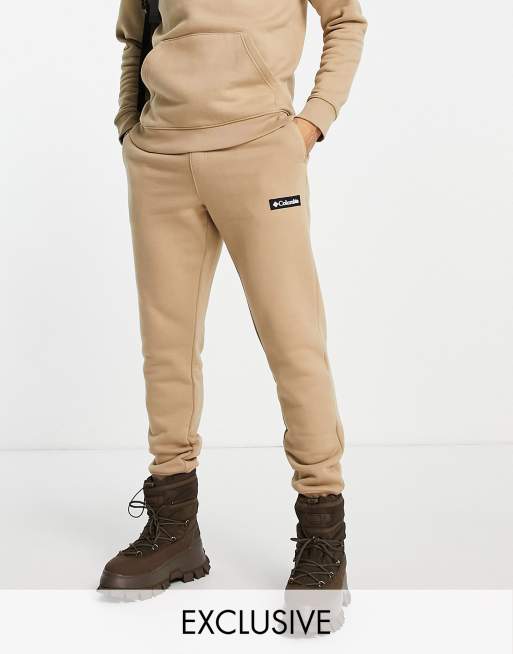 Columbia Cliff Glide joggers in beige Exclusive at ASOS 