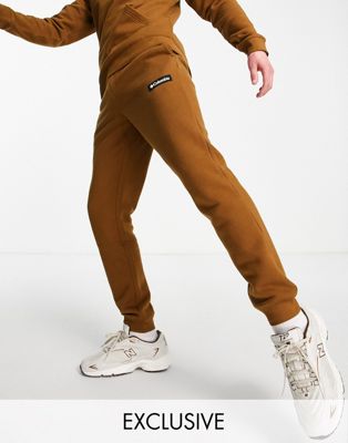 Columbia Cliff Glide joggers in brown Exclusive at ASOS - ASOS Price Checker