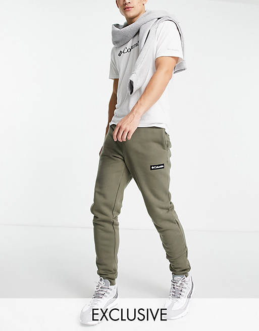Columbia Cliff Glide joggers in green Exclusive at ASOS