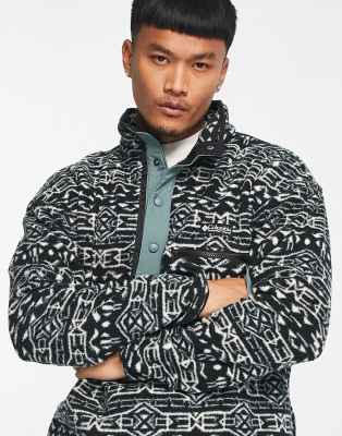 Helvetia 1/2 snap fleece in black geo print Exclusive to ASOS