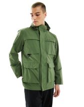 Barbour Chelsea waterproof hooded longline mac jacket in green | ASOS