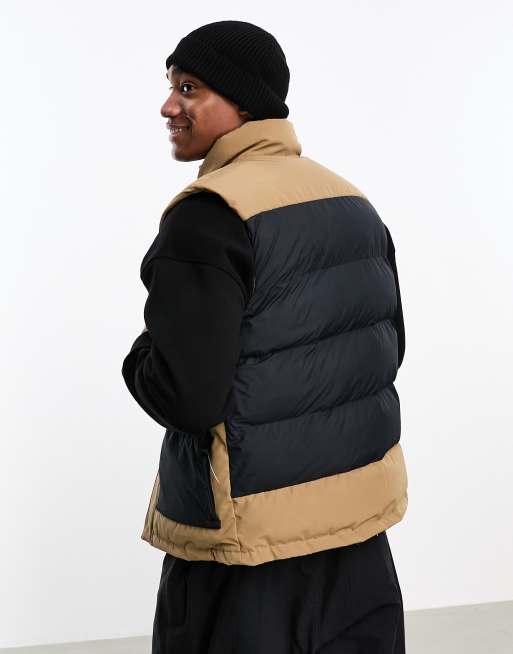 Columbia Marquam Peak Fusion Omni-HEAT gilet in brown ASOS