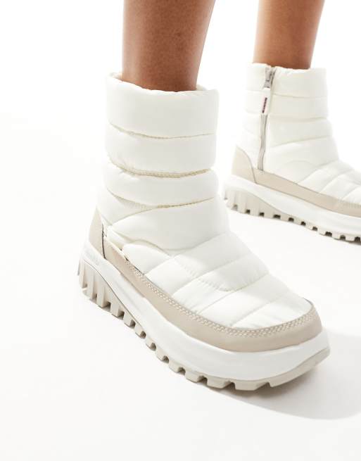 Columbia Snowtrot mid snow boots in sea salt and fig ASOS