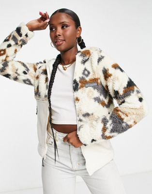 Columbia Winter Pass sherpa hooded zip up jacket in cream rocky mountain print - ASOS Price Checker