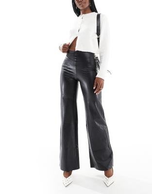 Commando faux leather wide leg pants in black