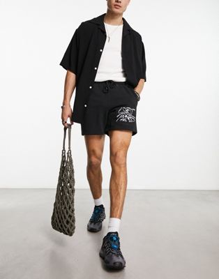 Coney Island Picnic co-ord jersey shorts in black with lost mind print