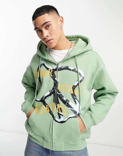 Coney Island Picnic seekers zip through hoodie in dusty green with graphic  print