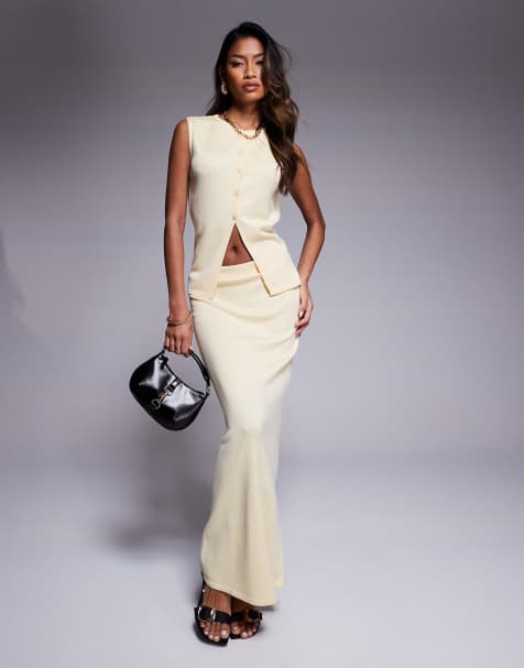 Conjunto amarillo mantequilla de chaleco de traje largo y falda larga de punto fino exclusivo de Kaiia - view 1