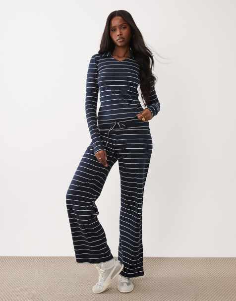 Conjunto azul marino a rayas de pantalones de pernera ancha y top de manga larga con cuello de pico y bolsillo delantero de tejido rico en algodón exclusivo de The Frolic - view 1