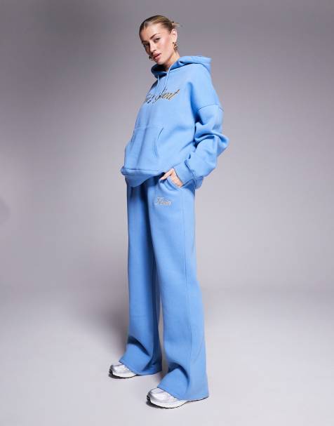 Conjunto azul y amarillo de joggers, sudadera con capucha y camiseta entallada con diseño encogido y estampado "France" de Kaiia Sport - view 1