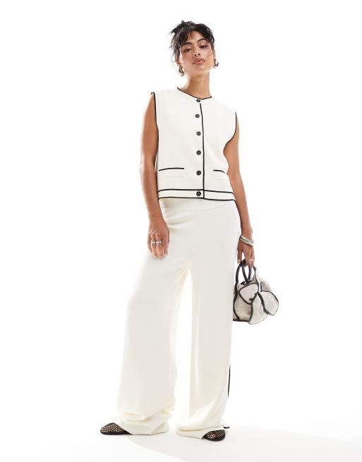 Conjunto blanco de pantalones y chaleco de punto de Mango
