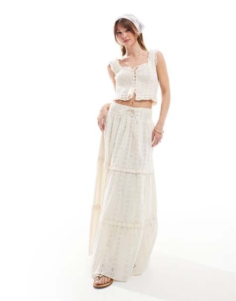 Conjunto color crema de falda larga y top fruncido con detalle de lazada y bordado inglés exclusivo de The Frolic - view 1