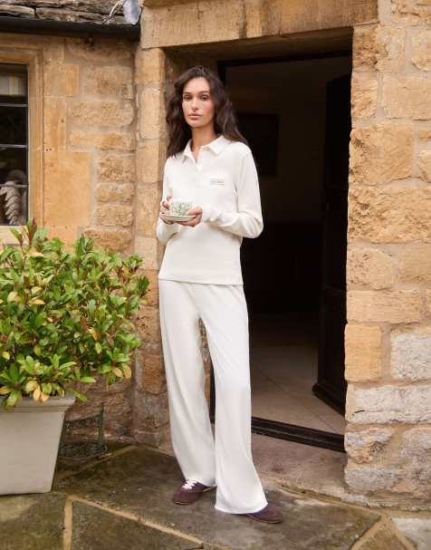 Conjunto color crema de pantalones de pernera ancha y top de manga larga con solapas de canalé de 4th & Reckless - view 1