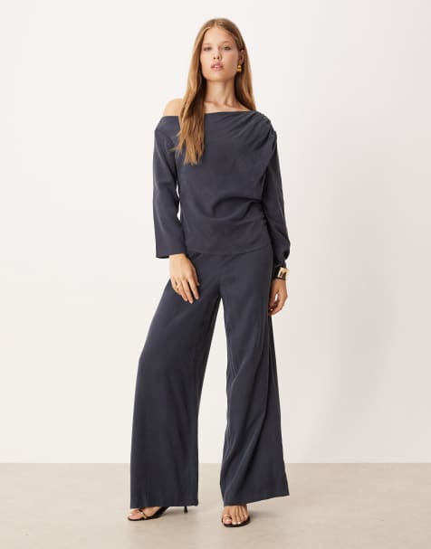 Conjunto color tinta lavado de top asimétrico y pantalones de pernera ancha con parte delantera lisa de tejido suave de ASOS DESIGN - view 1
