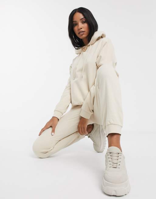 Conjunto de chándal color crema de sudadera con capucha y joggers de corte slim con lazada de algodón de ASOS DESIGN - CREAM, 4 de 4