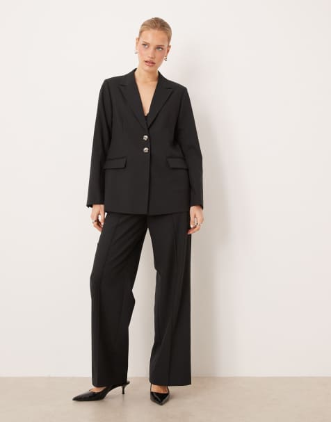 Conjunto de sastre negro de pantalones con pinzas y americana extragrande con botones efecto carey de YAS - view 1