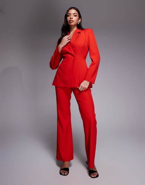 Conjunto de sastre rojo de pantalones de campana y americana con hombreras y cintura entallada exclusivo de Kaiia - view 1