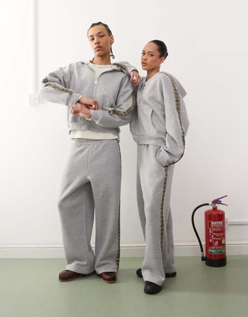Conjunto gris jaspeado unisex y detalle lateral a cuadros de Reclaimed Vintage