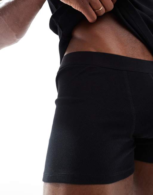 Conjunto negro de camiseta ajustada sin mangas y calzoncillos de canalé de ASOS DESIGN, 4 de 4