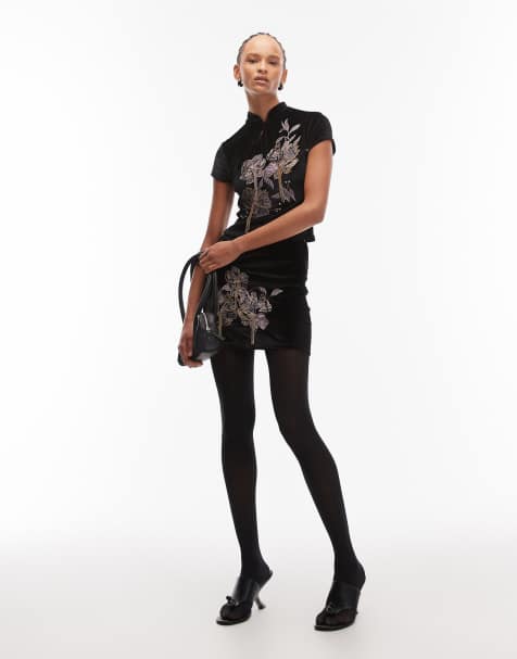 Conjunto negro de minifalda con detalle colgante de cuentas y top con bordado y detalle de botones rouleau de terciopelo de ASOS DESIGN - view 1