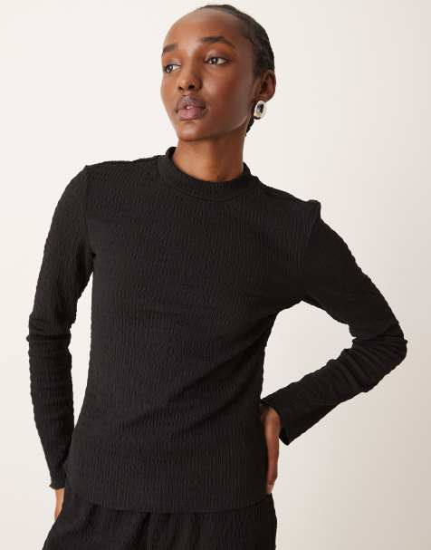 Conjunto negro de pantalones de pernera ancha y top de manga larga texturizado de Vila - view 1