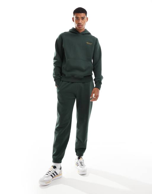 Conjunto verde oscuro con bordado trasero y logo de texto de Abercrombie & Fitch