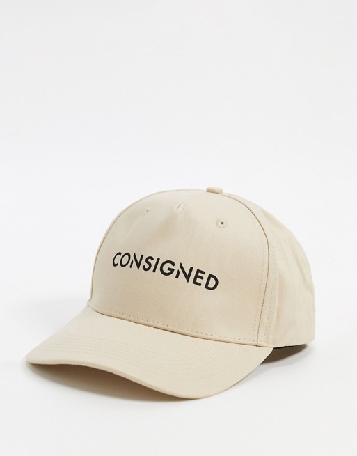 Consigned cap in sand