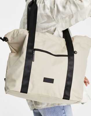 Consigned drawstring tote bag in sand