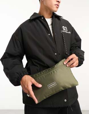 Consigned flat cross body bag in khaki - ASOS Price Checker