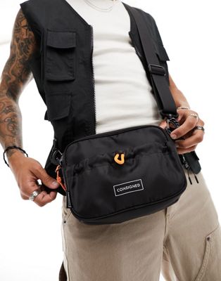 Consigned front pocket cross body bag in black