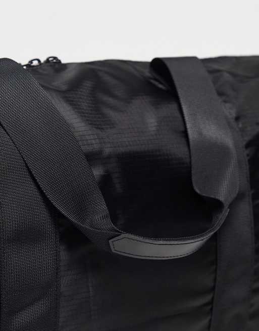 Consigned – Nylon-Reisetasche in Schwarz, 4 von 4