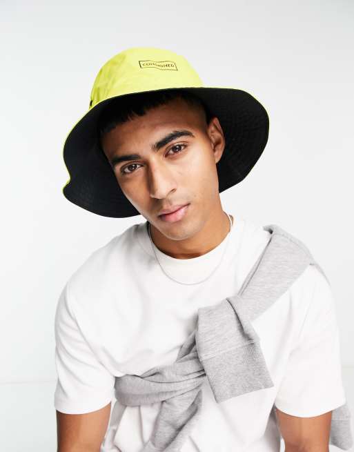 Consigned reversible bucket hat in black and yellow
