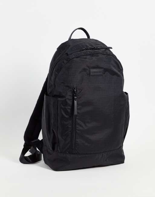 Slim profile backpack sale