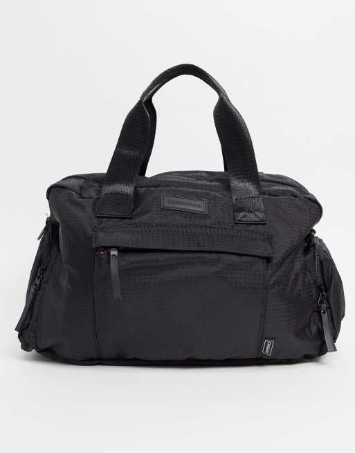 Consigned sports lux holdall bag in black ASOS