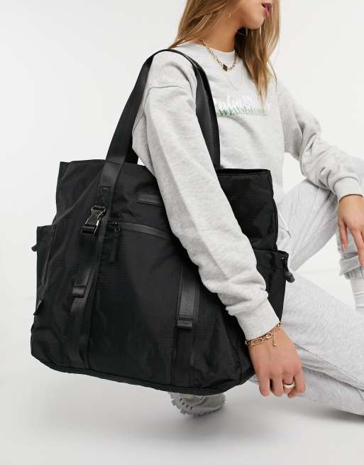 Consigned - Tote-taske med klipfront i sort ribstop