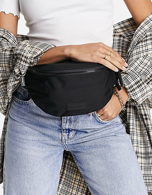 Consigned zip around fanny pack in black | ASOS