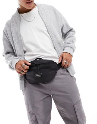 Consigned zip top bum bag in black