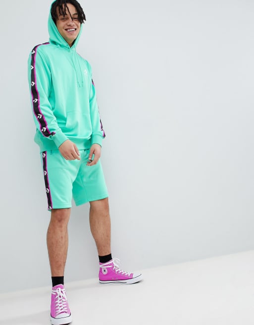 Converse 10007588 A04 Felpa verde con cappuccio e fettucce laterali con righe
