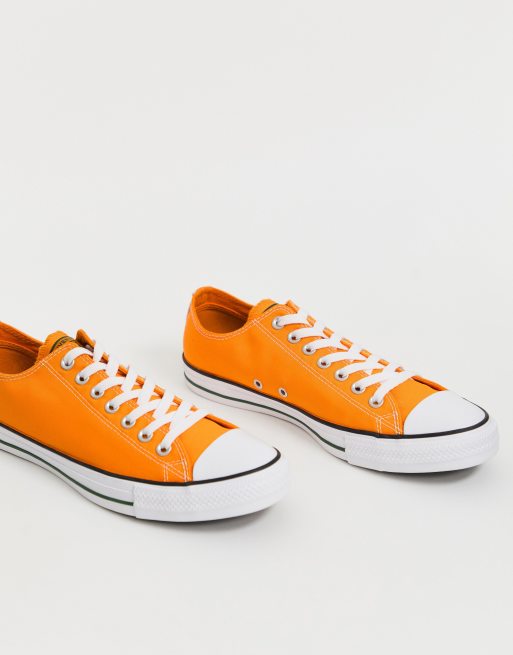 Converse gialle store basse