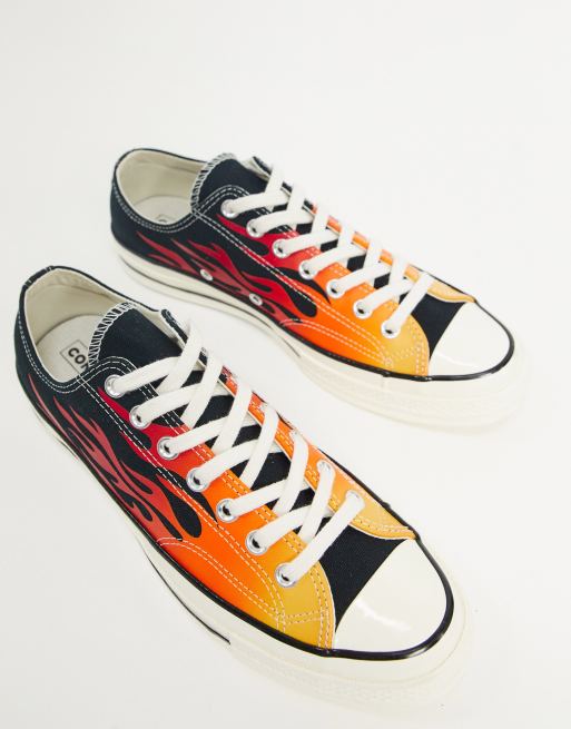 Converse hotsell nere fiamme