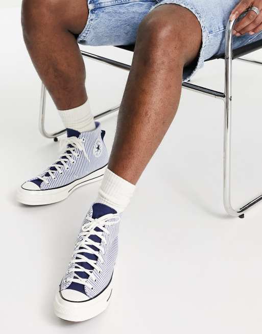 White converse store with blue stripe