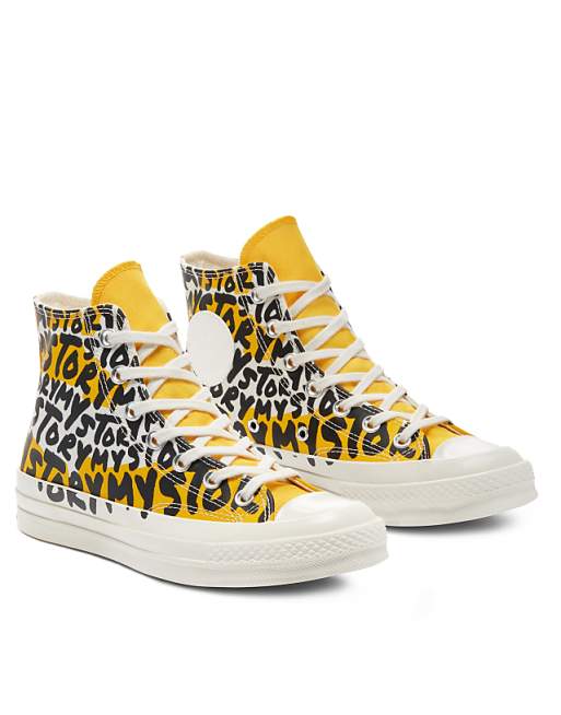 Converse Chuck 70 Hi My Story all over print canvas sneakers in amarillo/black Converse Chuck 70 Hi My Story all over print canvas sneakers in amarillo/black