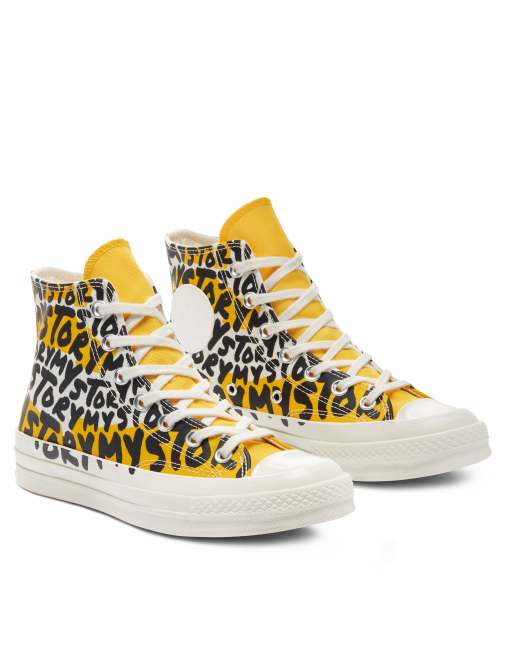 Converse 70 Hi Story over print sneakers in amarillo/ black | ASOS