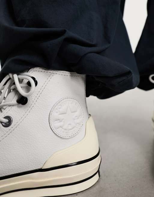 Converse bianche store di pelle